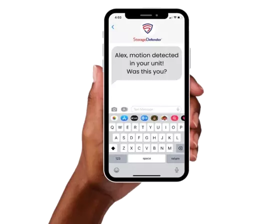 6719ad25347fff594e10cd73895bff79.webp Hand holding storage defender text