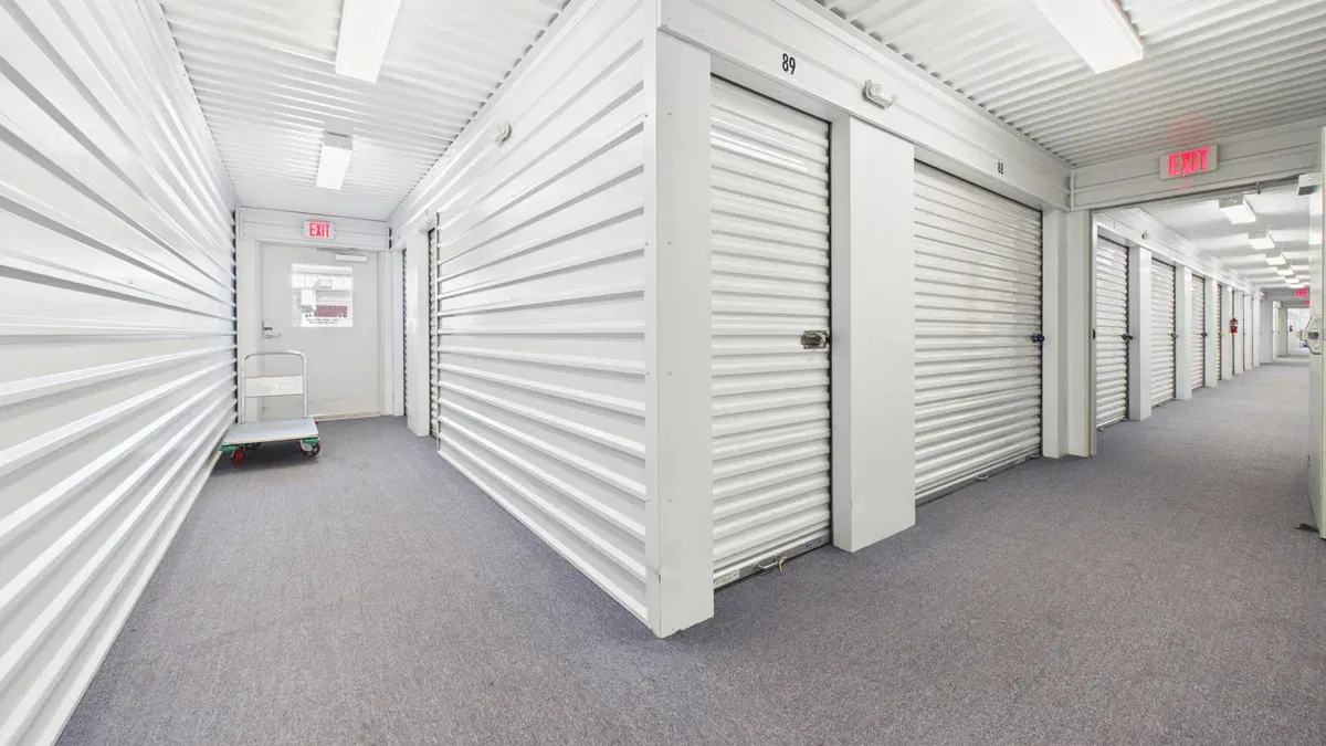 climate-controlled-storage.webp White climate-controlled storage hallway with carpet