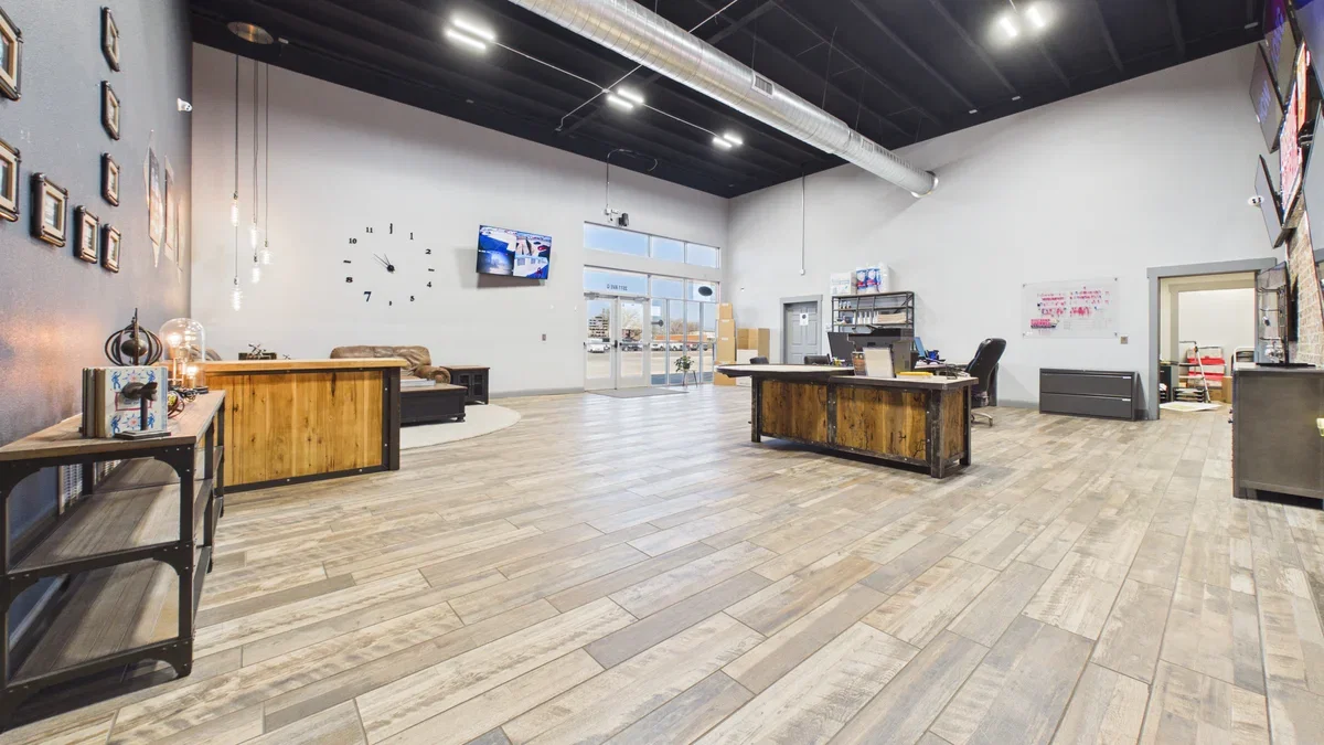 Modern office lobby with wooden desks