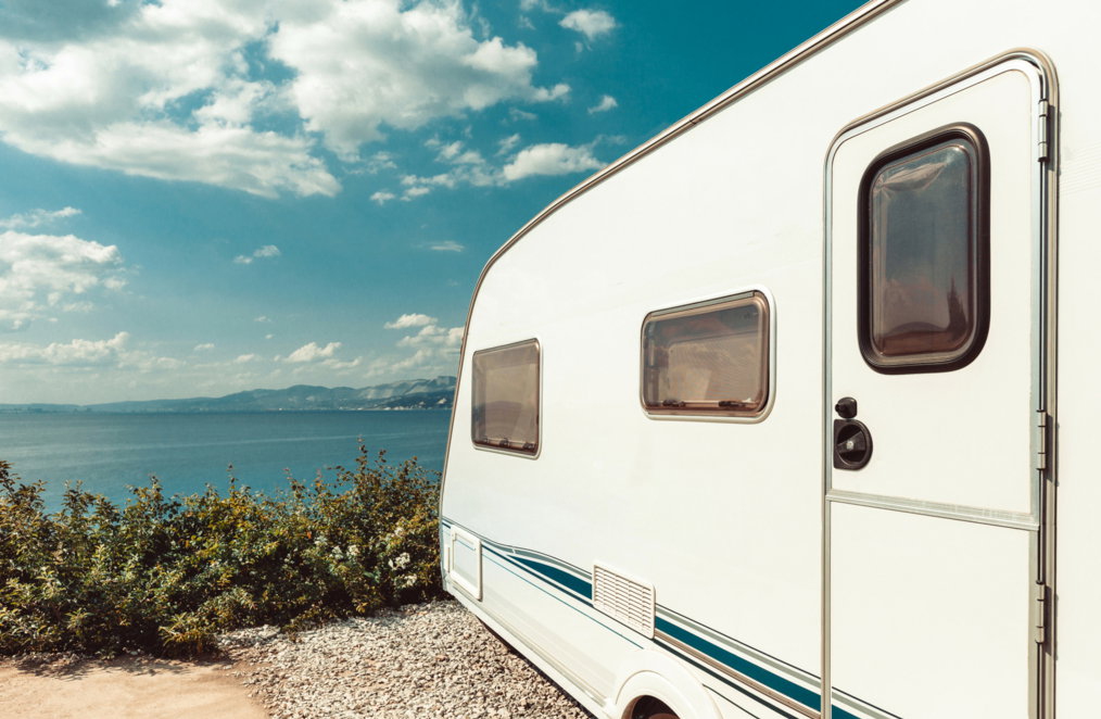 A recreational vehicle parked at a storage facility