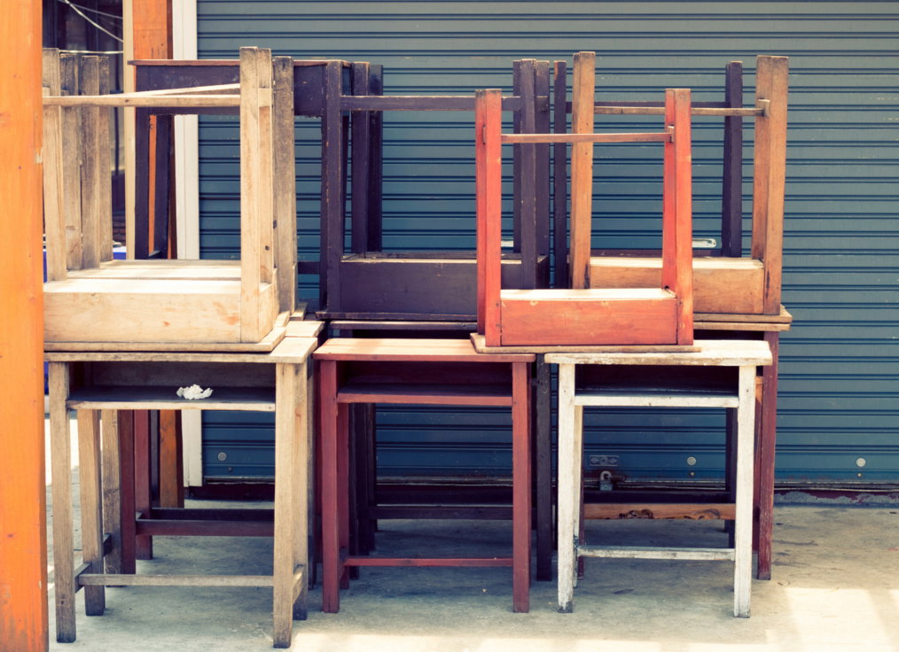 Cardboard moving boxes stacked inside a storage unit