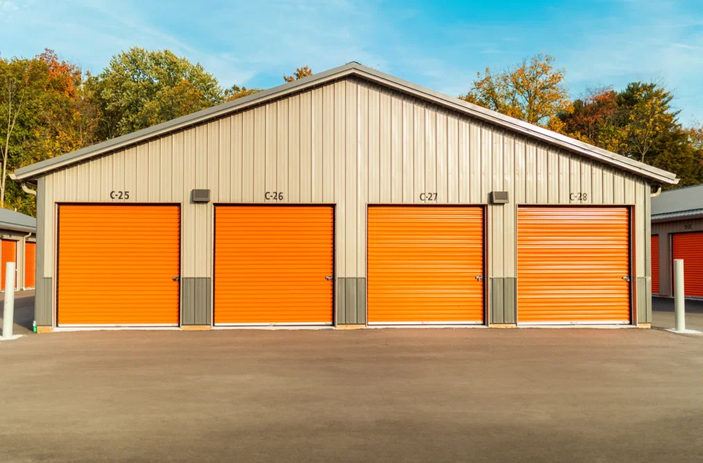 Covered RV parking spaces at a Mini Mall Storage facility