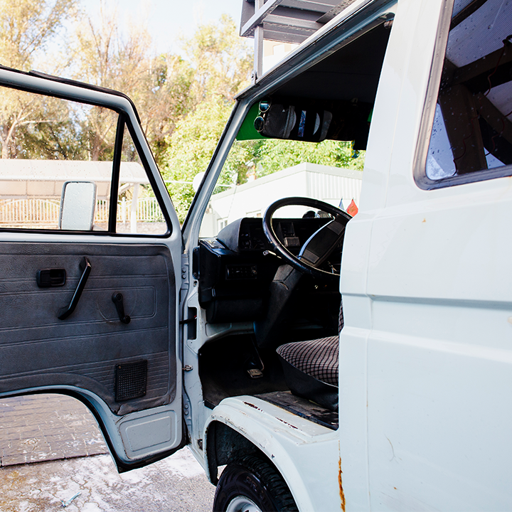 work-van-with-open-door-parked.png
