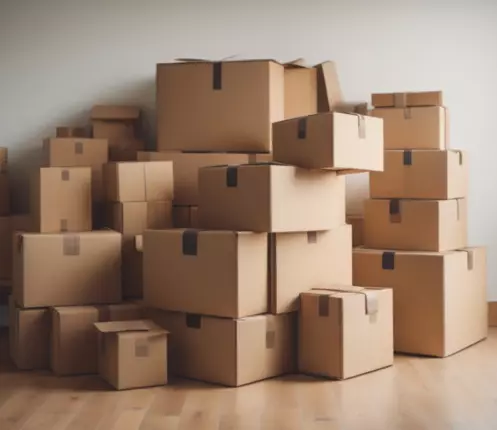 Stacked moving boxes in a clean room ready for packing or self storage at Storage Star.