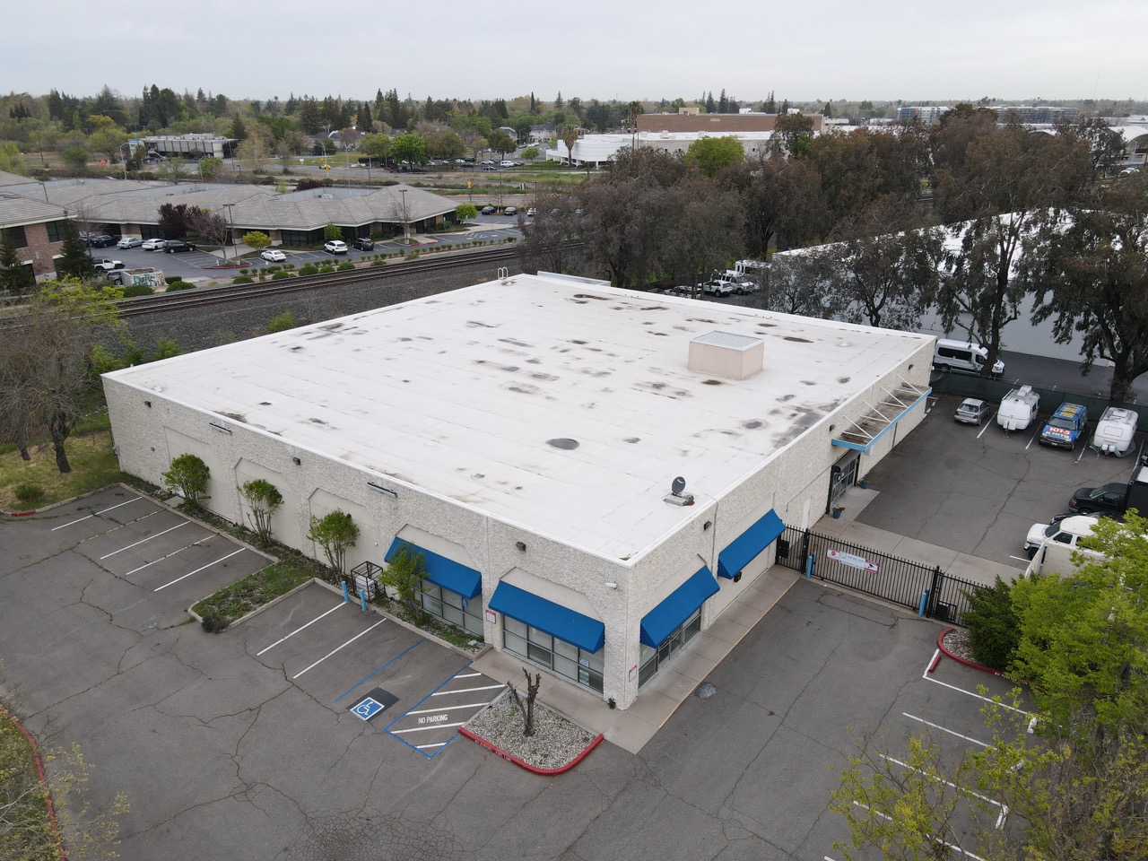 Aerial view of secure self storage property with outdoor and indoor units