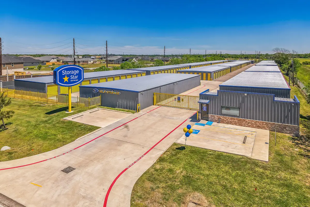 Main gated entrance and office at Storage Star Baytown with secure keypad access and on site customer service